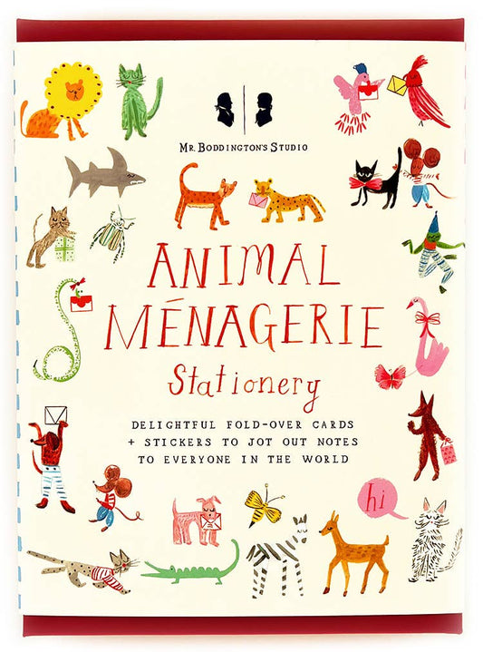 An animal stationery set by Mr. Boddington's Studios. The box of stationery has fun pictures of animals all over the cover of the box. The words Animal Menagerie Stationery . Delightful Fold-over cards an stickers to jot out notes to everyone in the world. 