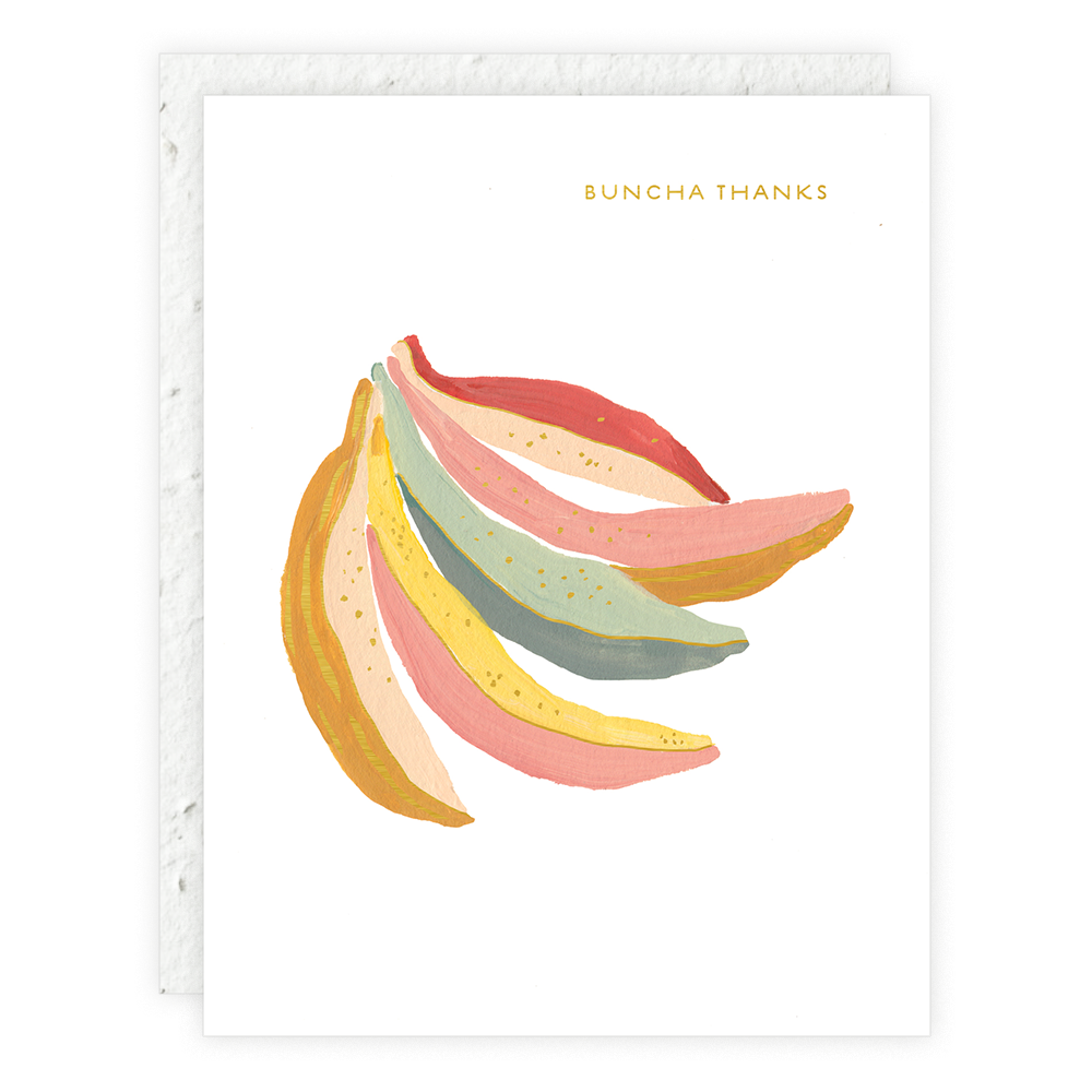 A Thank You card from Seedlings. The front has a bunch of bananas with colors and foil accents. The words read in golden foil Buncha Thanks. The card is soft white and the envelope is a soft white,plantable envelope with non-invasive wildflower seeds.