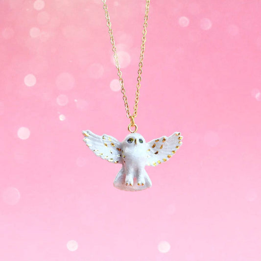 Gold and White Snowy Owl